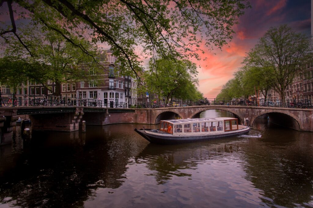 Boat cruise during sunset Amsterdam
