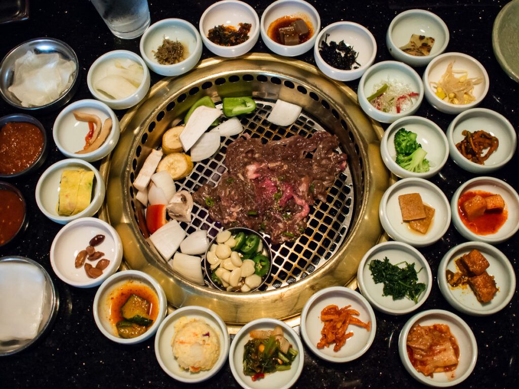 A full set of dishes at a Korean BBQ Amsterdam