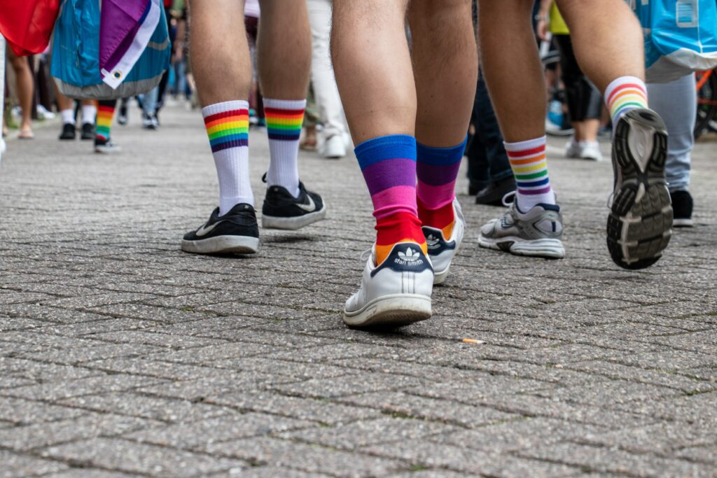People with coloured socks during the pride.