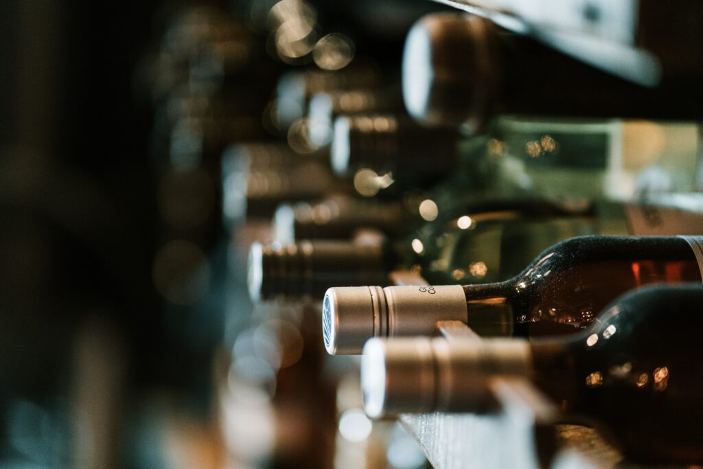 Wine bottles in a rack. 