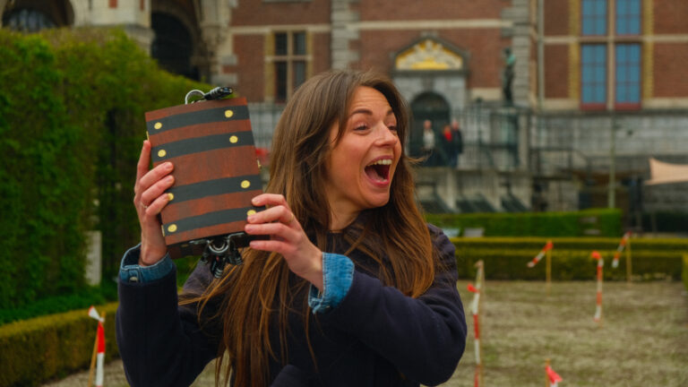 A happy girl with a treasure box, London Treasure Hunt