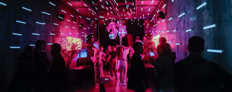 Party lights, people dancing, Office Party London